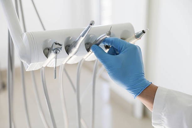 Professional Tooth Extraction technician working in Albuquerque, NM